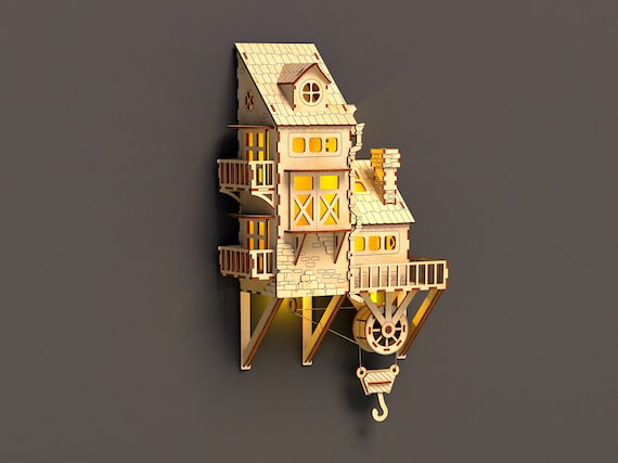 Hanging house with light wall decoration